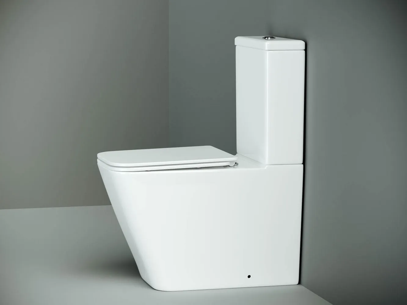 Напольный пристенный унитаз Cubic Rimless